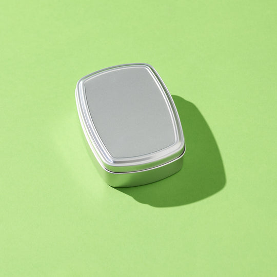 A rectangular tin with slightly curved sides. The lid features a step and the tin itself is silver. The product code is T9875.